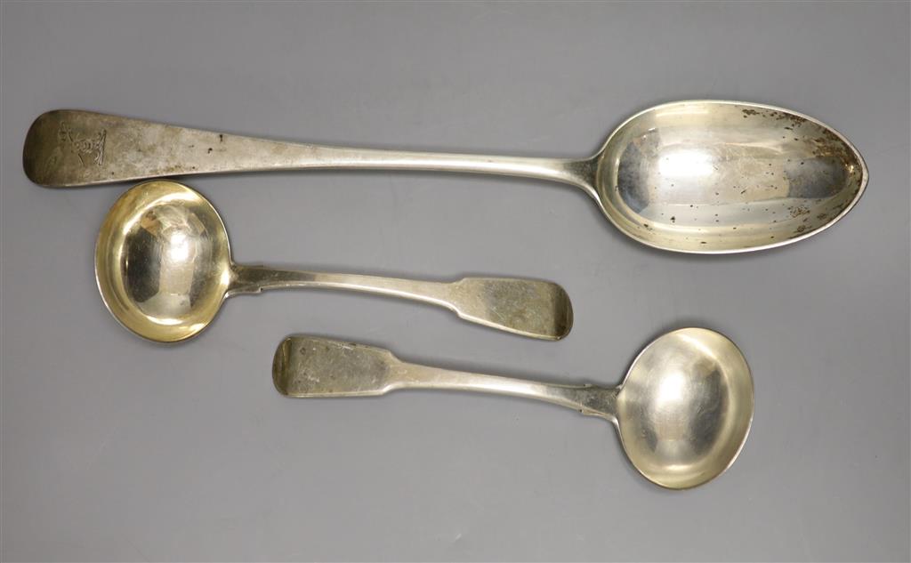 A Victorian silver gravy spoon and a pair of sauce ladles